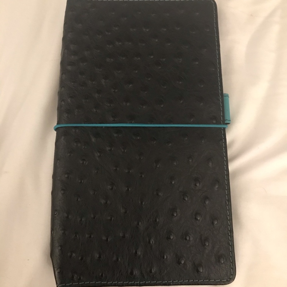 Van Dek Spek Complete Nomad in black ostrich.